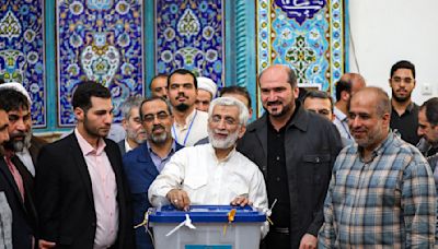 Iran seesawing vote results put race between reformist Masoud Pezeshkian and hard-liner Saeed Jalili