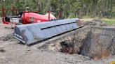 Stuck with 15,000 yards of tornado debris? St. Tammany's burning it in a giant hole.