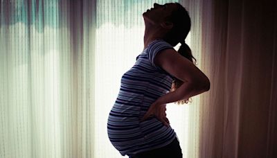 Lower back pain in the third trimester of pregnancy: What it means