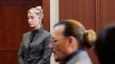 Amber Heard Says Johnny Depp Was Too ‘Obsessed With Dog Poop’ To Discuss Divorce During Blowout Fight