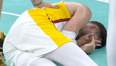 Horror moment basketball star hit in the face by his own team-mate's knee