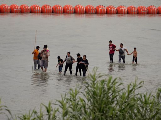 Texas’ floating Rio Grande barrier can stay for now, court rules as larger legal battle persists