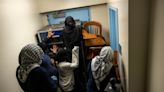 Columbia chaos escalates as pro-Gaza protesters seize campus hall and college threatens expulsions