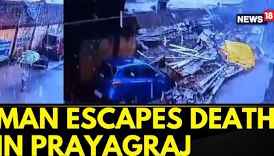 Man Narrowly Escapes Death As Boundary Wall Collapses After Heavy Rains In Prayagraj | News18 - News18