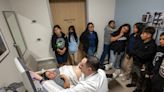 Teens learn to wrap a sprain and see an ultrasound at Dignity Health Northridge