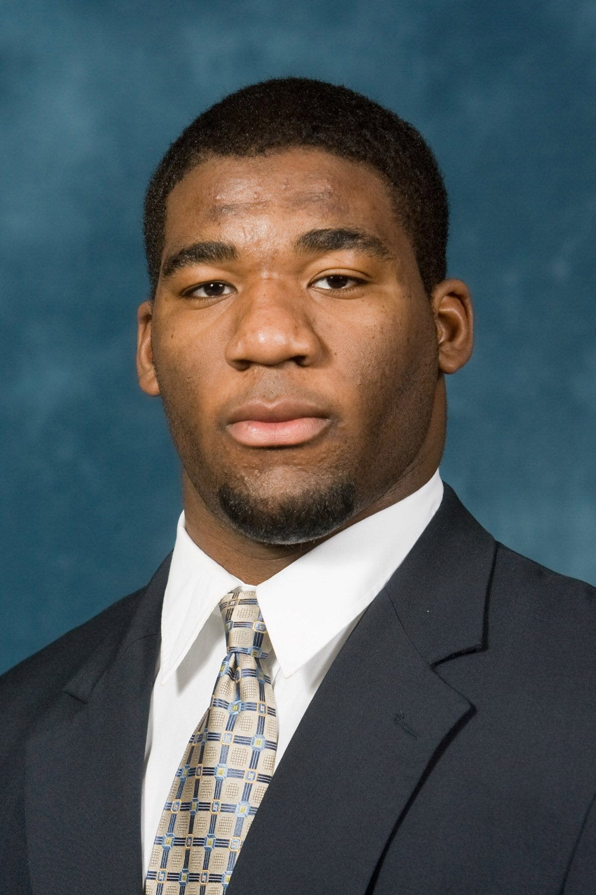 Obi Ezeh, a former Michigan football and GR Catholic Central standout LB, dies at 36