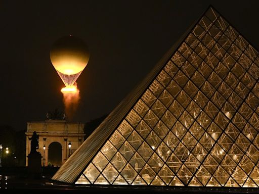 Paris dazzles with a rainy Olympics opening ceremony on the Seine River