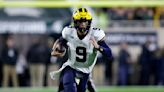 McCarthy throws 3 TD passes in 1st half, No. 2 Michigan routs Michigan State 49-0