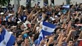 Supporters of El Salvador's President Nayib Bukele attend his inauguration ceremony