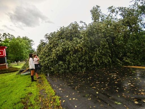 Storms flood the Ozarks and strand drivers in Toronto. New York community is devastated by tornado