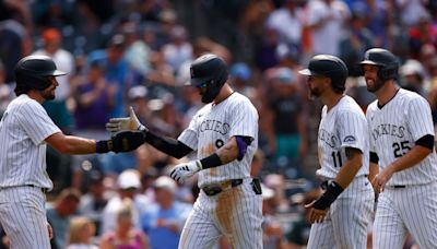 Rockies tie franchise record for runs in 20-7 win