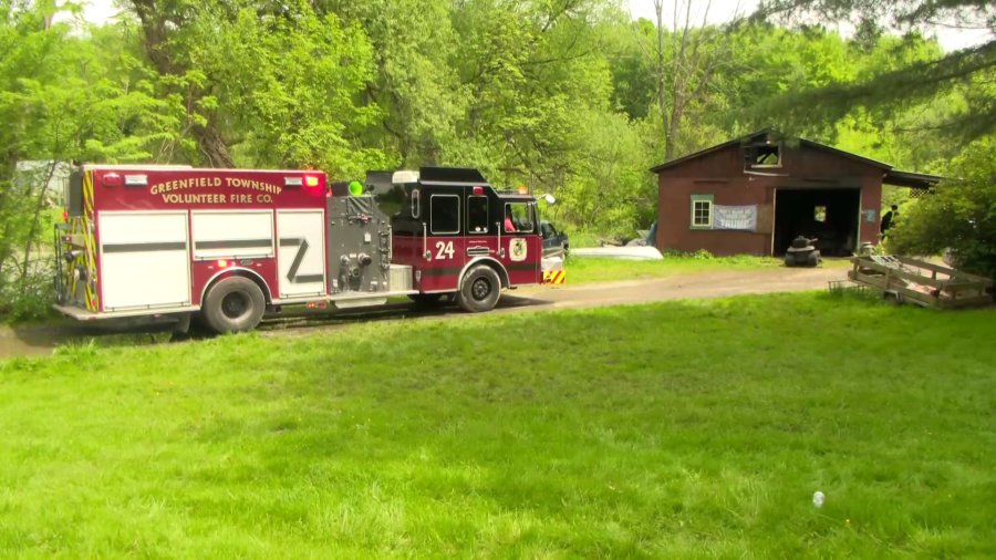 Crews battle garage fire in Greenfield Township