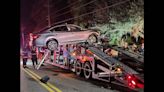 Baffling crash saw passing car drive onto trailer, teeter off edge, Florida crew says