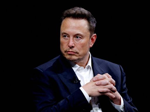 Tesla, Musk beat shareholder lawsuit over self-driving promises