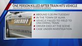 One person dead after vehicle and train collide