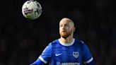 Pompey defender Ogilvie agrees new two-year deal