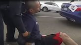 Watch: Fleeing suspect clings to door of vehicle he tried to carjack