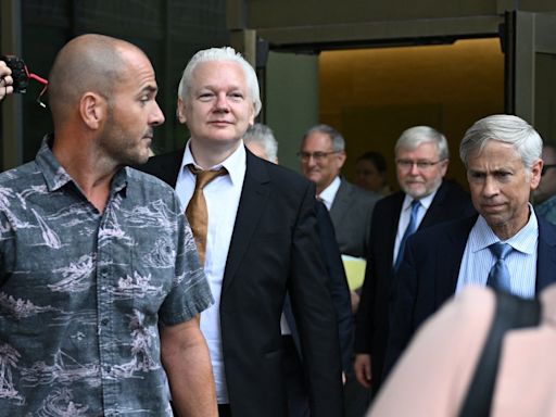 Julian Assange walks free after making deal with US to plead guilty in remote Pacific island court