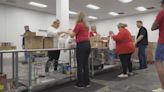 Project 5 volunteers put in some labor at Operation Food Search