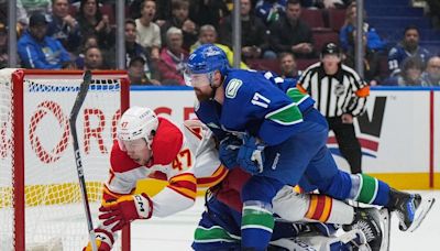 Flames 6, Canucks 5 (OT): J.T. Miller's 'Gordie Howe hat trick' not enough in opener