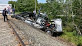 Truck driver injured after train hits tractor-trailer in Prospect