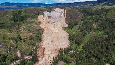 Authorities in Papua New Guinea search for safer ground for thousands of landslide survivors