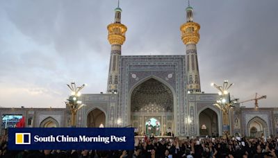 Iran’s President Raisi buried in Mashhad, as mourners pack holy city