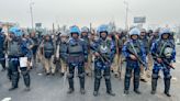 La policía utiliza gases lacrimógenos contra agricultores que marchan hacia Nueva Delhi