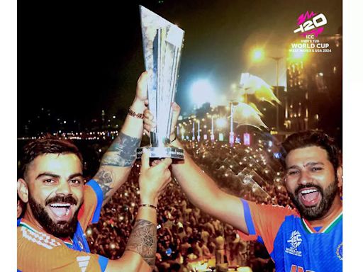 Watch: Unseen video of Virat Kohli convincing Rohit Sharma for a picture during T20 World Cup victory parade | Cricket News - Times of India