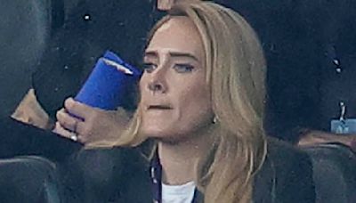 Adele looks tense as she attends England's Euros semi final