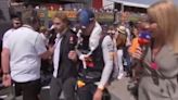 TV reporter dragged off F1 grid by security during Max Verstappen interview