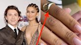 Zendaya wore a gold ring that appears to be engraved with boyfriend Tom Holland's initials