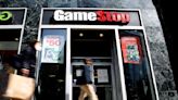 GameStop shares jump sharply in odd trading; AMC shares also pop