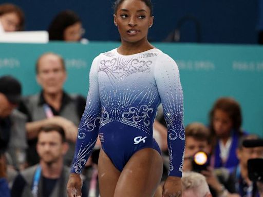 Simone Biles slips off the balance beam and fails to win gold for the first time in Paris