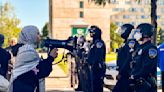 Police with batons approach Israel-Hamas war protesters at UC Santa Cruz