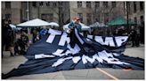 Protesters fight over ‘Trump lies all the time’ banner