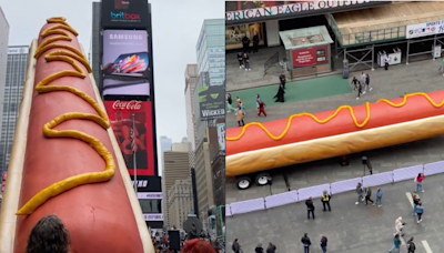 The Bizarre Reason Why A 65-Foot Hot Dog Is In Times Square