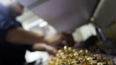 Gold rises, yields retreat after softer US jobs data