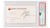 Steve Jobs memorabilia like a signed Apple business card and even a movie ticket just sold for a lot