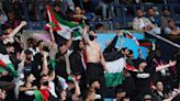 Chants of 'Heil Hitler' shouted by antisemitic protestors at Israel Olympic soccer game