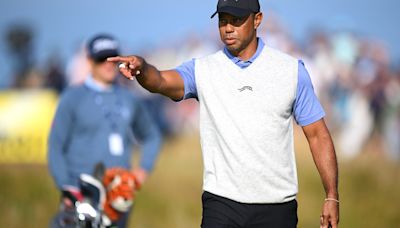 'Limping' Tiger Woods nearly makes hole in one on Postage Stamp at Royal Troon