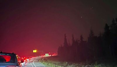 Wildfire reaches town in the Canadian Rockies' largest national park as attempt to reroute it fails