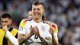 Kroos pep talk calms Germany before record win