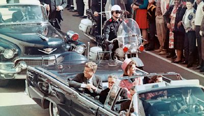 New Video Shows Motorcade Rushing To Hospital After JFK Was Shot | iHeart