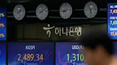 Asian shares mixed after Wall St dips on weak economic data