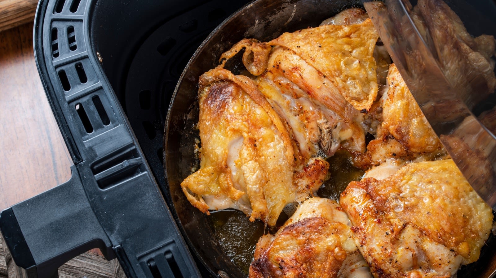 The Mistake You're Making When Cooking Chicken Thighs In The Air Fryer