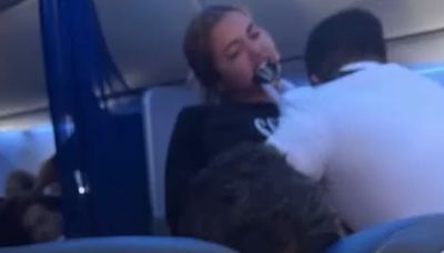 Unhinged passenger bites chunk out of flight attendant's uniform