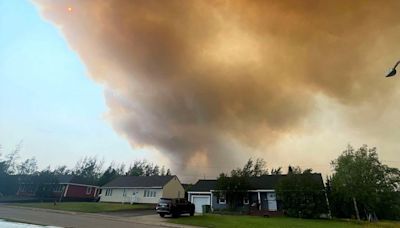 Thousands evacuated as ‘extremely aggressive’ wildfire burns in eastern Canada