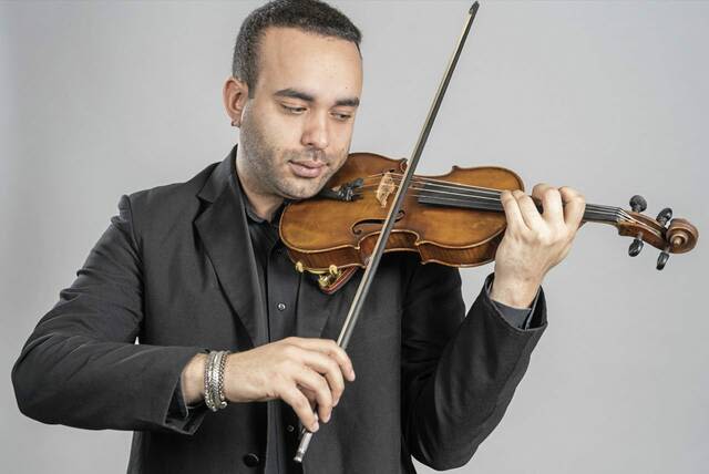 Duquesne student's journey from a cracked violin to master's degree, fellowship