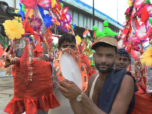 Pics: With 'Holy Water', Kanwariyas' Colourful Yatra From Haridwar